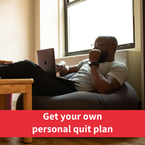 Man on bean bag with laptop on legs reading, text reads 'get your own personal quit plan'