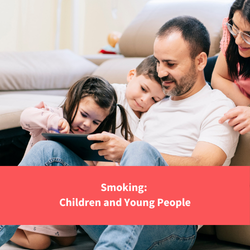 a father playing on a tablet with his children, text reads "smoking: vaping and young people"