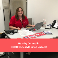 healthy cornwall staff member sat behind a desk with a laptop, text reads  "healthy cornwall - healthy lifestyle email updates"
