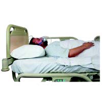 a man laying in a hospital bed