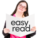 person holding an easy read sign