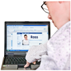 image of a young man looking at his facebook page