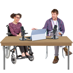 two people sat behind a desk recording a podcast