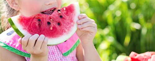 girl eating water melon